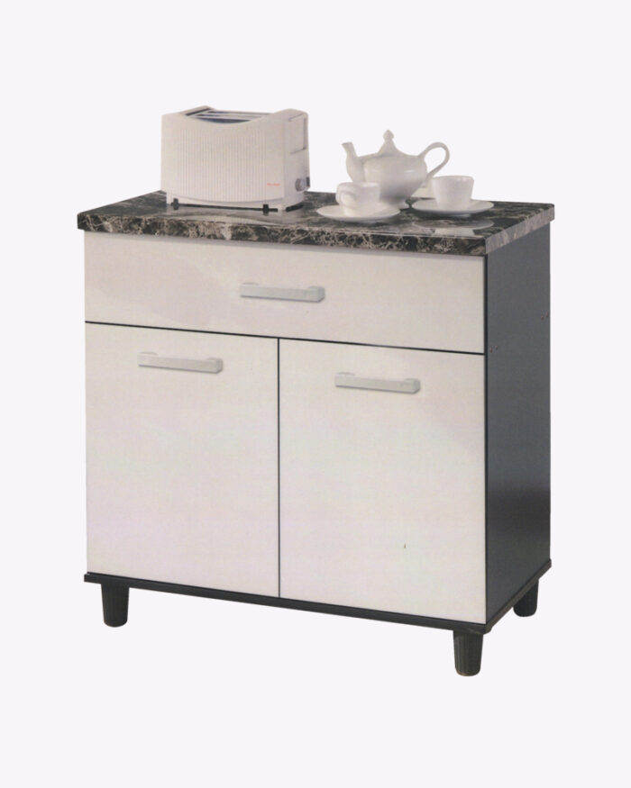 a tea set and a bread toaster above a stand alone kitchen cabinet