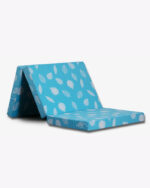 folded blue mattress