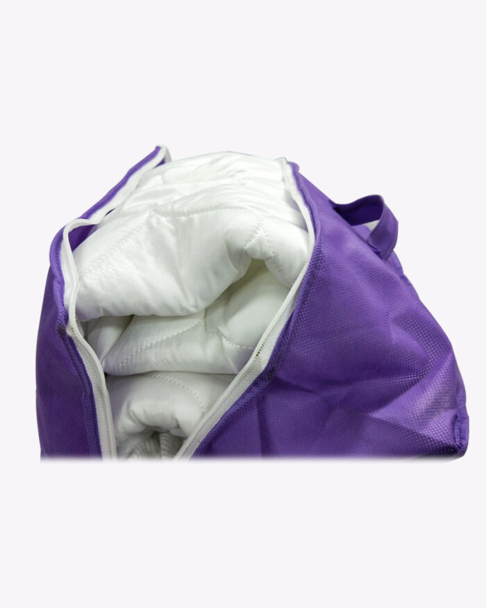 white mattress protector in a zipper bag
