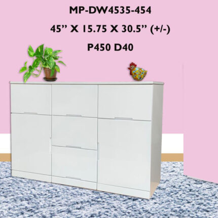 a plant on a wooden white 5 drawers and 2 doors cabinet