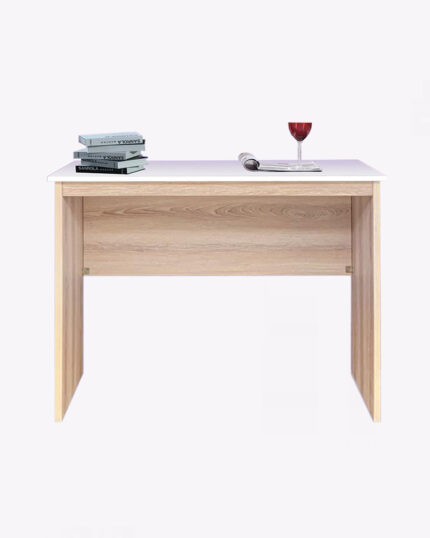 books and wine on a plain wooden study table