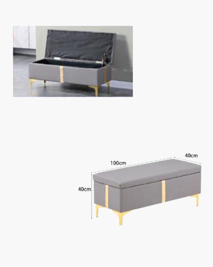 Light grey storage ottoman with gold accents