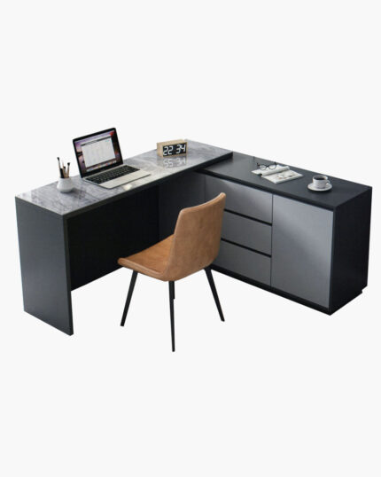 An L-Shaped Table with a laptop and chair